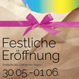 Ein angerissenes Packpapier mit rosa SChleife, dahinter kommen die ZAM Farben heraus. Das ZAM ist ein Geschenk.
